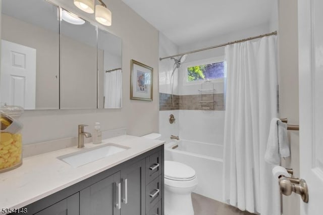 bathroom featuring vanity, shower / bathtub combination with curtain, and toilet