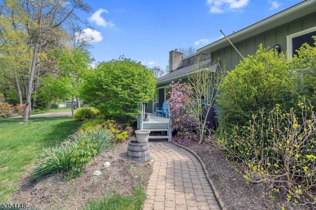 view of yard with a wooden deck