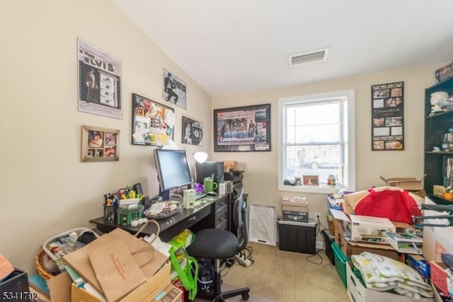 carpeted home office featuring visible vents