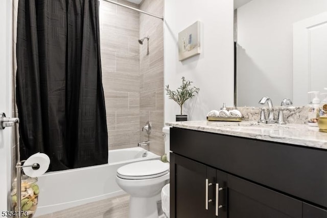 bathroom with toilet, shower / bath combination with curtain, and vanity