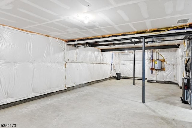 unfinished basement featuring visible vents