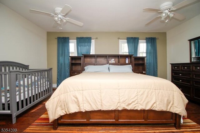bedroom with a ceiling fan and wood finished floors