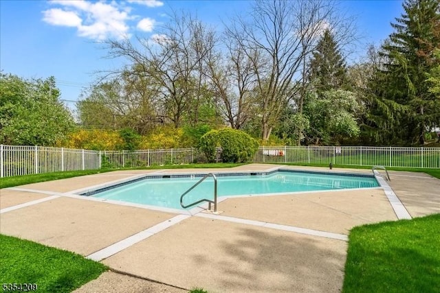 view of swimming pool with fence, a fenced in pool, and a patio area