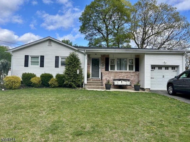 single story home with a porch, aphalt driveway, a front lawn, and a garage
