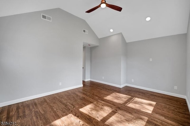 empty room featuring baseboards, a ceiling fan, wood finished floors, and visible vents