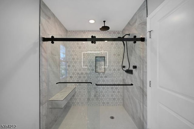 full bath featuring a shower stall