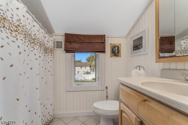bathroom with visible vents, curtained shower, vanity, tile patterned floors, and toilet