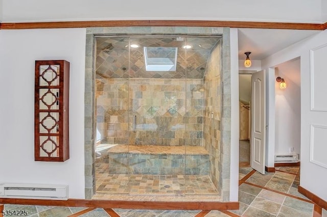 interior details with baseboards and a baseboard radiator