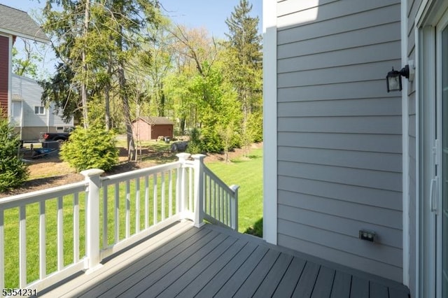 deck featuring a yard