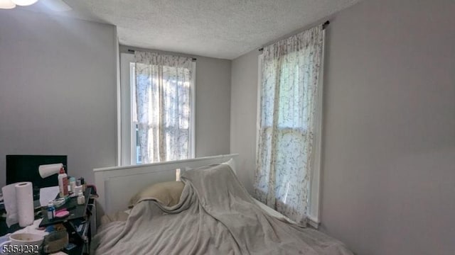 810-814 Leland Ave, Plainfield City, NJ 07062 - bedroom with a textured ceiling