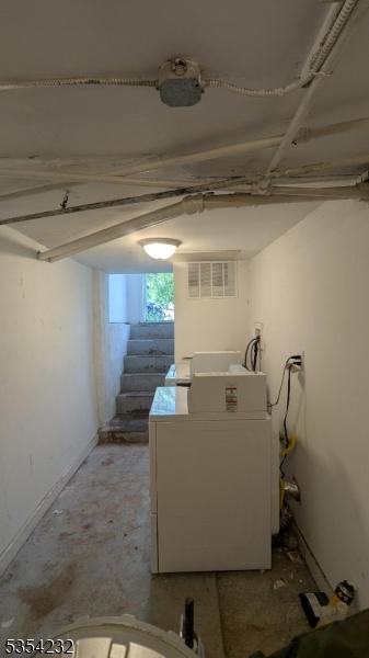 810-814 Leland Ave, Plainfield City, NJ 07062 - below grade area featuring separate washer and dryer and stairs