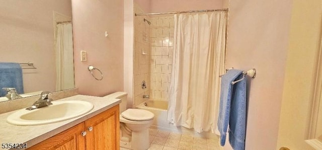 full bath with vanity, tile patterned flooring, shower / bath combo, and toilet