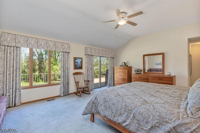carpeted bedroom with ceiling fan, access to exterior, visible vents, vaulted ceiling, and baseboards