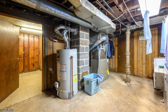 unfinished basement with gas water heater