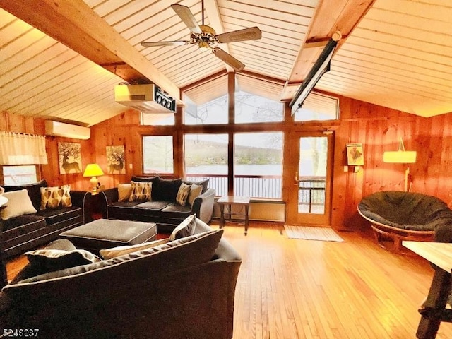 639 Canistear Rd, Vernon Twp, NJ 07422 - living room with ceiling fan, lofted ceiling with beams, wood walls, hardwood / wood-style floors, and a wall mounted AC