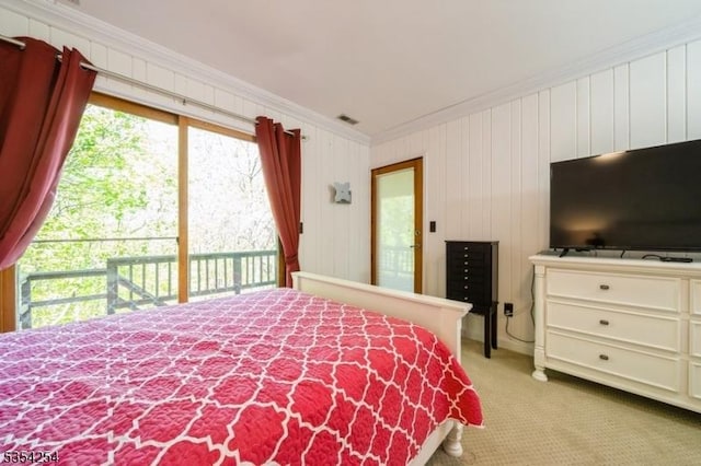 bedroom featuring crown molding, access to outside, visible vents, and light carpet