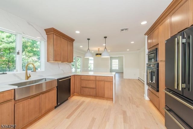 kitchen with oven, high end refrigerator, a peninsula, visible vents, and dishwashing machine
