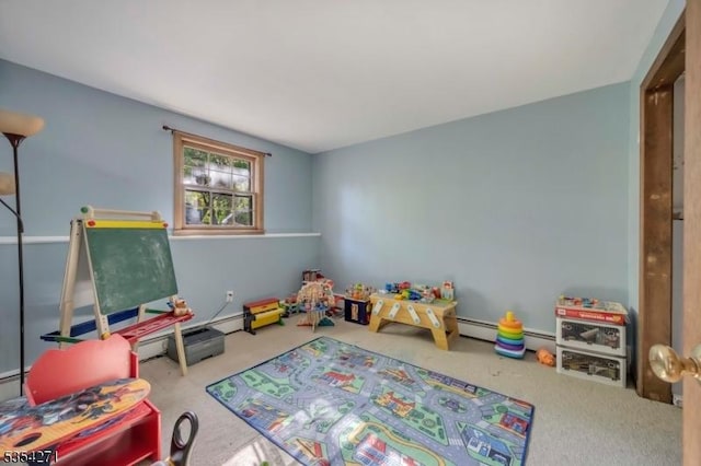 12 Fox Ledge Dr, Vernon Twp, NJ 07418 - playroom with carpet floors and a baseboard heating unit