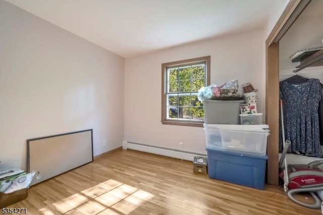 12 Fox Ledge Dr, Vernon Twp, NJ 07418 - interior space with wood finished floors, baseboards, and a baseboard heating unit