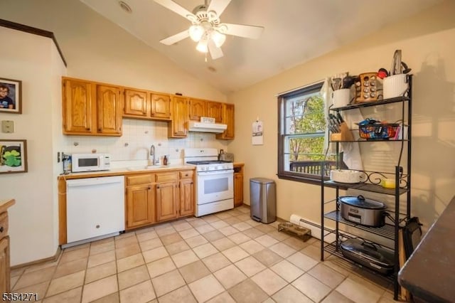 12 Fox Ledge Dr, Vernon Twp, NJ 07418 - kitchen with a sink, light countertops, lofted ceiling, under cabinet range hood, and white appliances