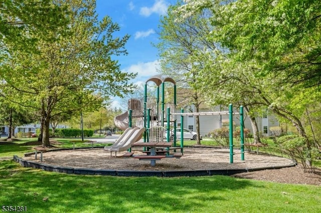 community play area featuring a lawn