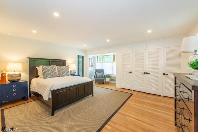 bedroom featuring recessed lighting and light wood-style flooring
