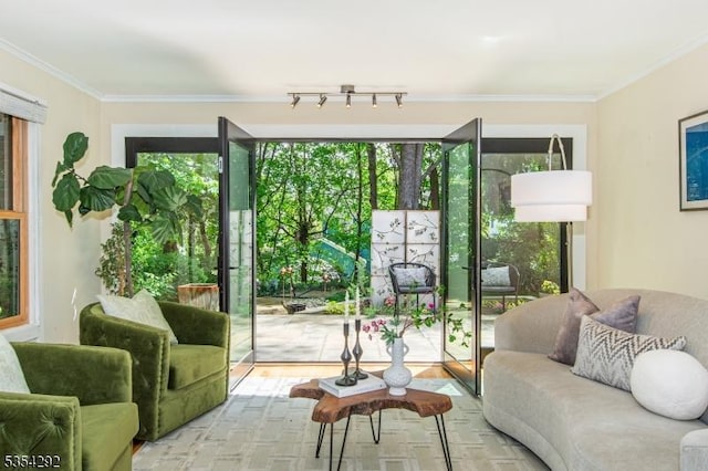interior space featuring ornamental molding and wood finished floors