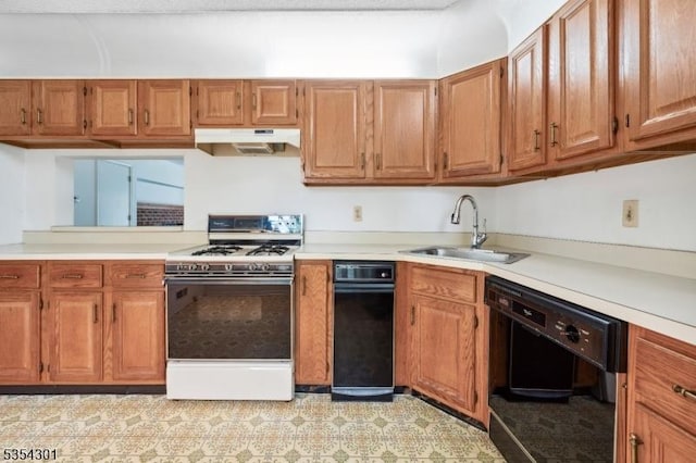 kitchen featuring white range with gas cooktop, a sink, under cabinet range hood, light countertops, and black dishwasher