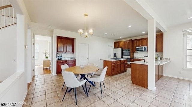 dining area with recessed lighting, baseboards, light tile patterned floors, and a notable chandelier