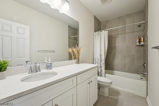 bathroom featuring tile patterned flooring, vanity, toilet, shower / bath combination with curtain, and visible vents