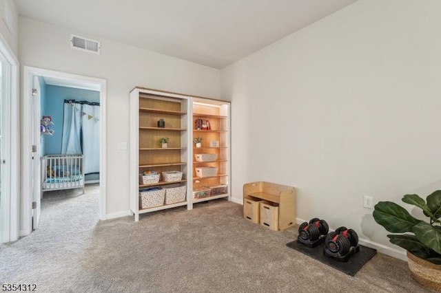 bedroom featuring carpet and visible vents