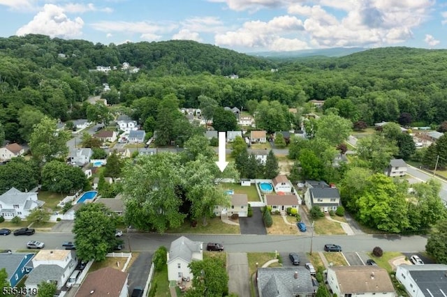 aerial view with a residential view and a forest view