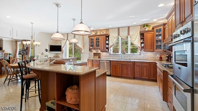 37 Gregory Ave, West Orange Twp, NJ 07052 - kitchen featuring brown cabinets, open shelves, stainless steel appliances, light tile patterned floors, and a sink