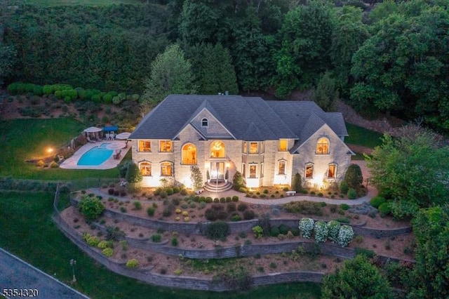 37 Gregory Ave, West Orange Twp, NJ 07052 - georgian-style home featuring an outdoor pool and a forest view