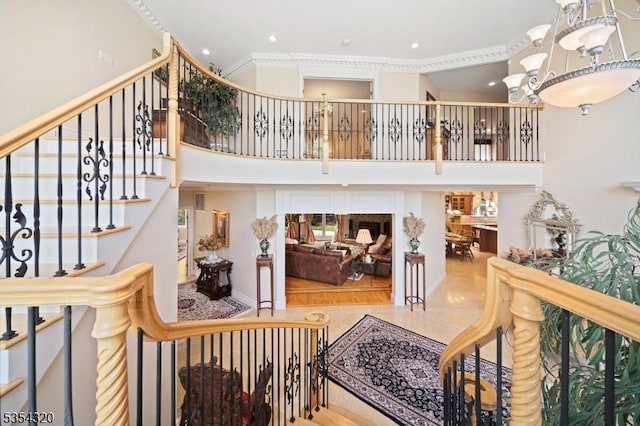 37 Gregory Ave, West Orange Twp, NJ 07052 - stairs with recessed lighting, ornamental molding, a high ceiling, and a chandelier