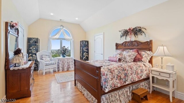 37 Gregory Ave, West Orange Twp, NJ 07052 - bedroom with vaulted ceiling, light wood-style flooring, and baseboards
