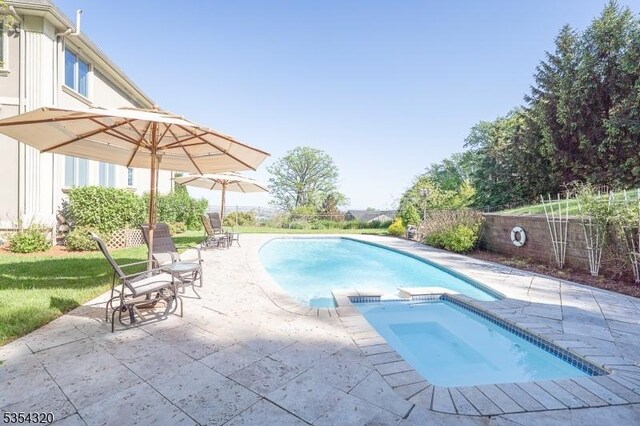 37 Gregory Ave, West Orange Twp, NJ 07052 - view of swimming pool with a patio area, a pool with connected hot tub, and a fenced backyard