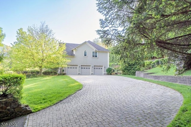 37 Gregory Ave, West Orange Twp, NJ 07052 - view of front of house featuring decorative driveway, a garage, and stucco siding