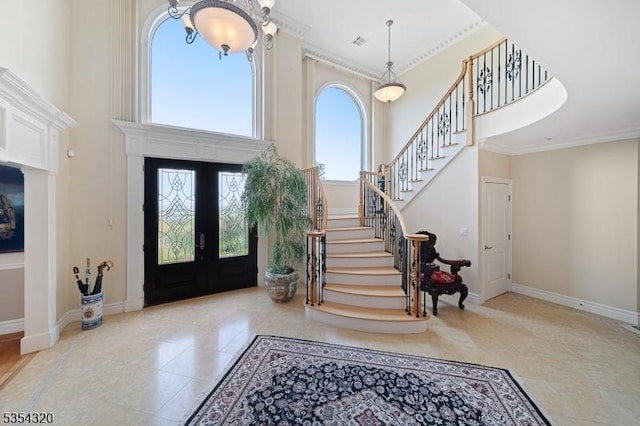37 Gregory Ave, West Orange Twp, NJ 07052 - entrance foyer featuring stairs, french doors, baseboards, tile patterned floors, and ornamental molding