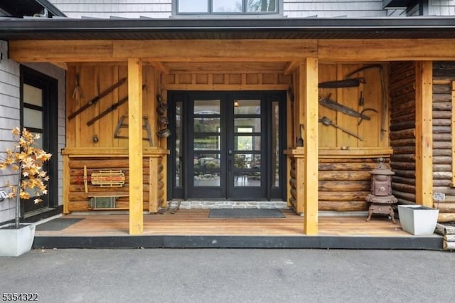 property entrance featuring french doors