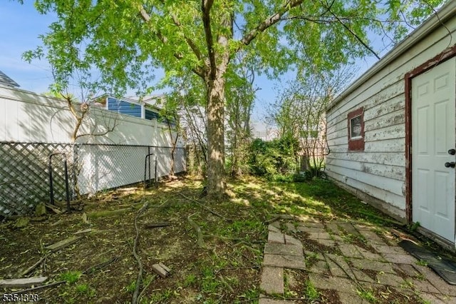 view of yard with fence