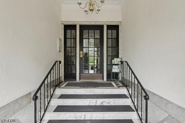 view of exterior entry featuring stucco siding