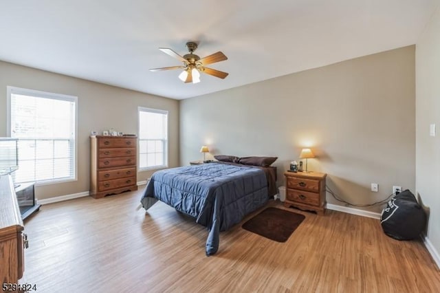 5 Bridgewater Ave, Stafford Twp, NJ 08050 - bedroom with baseboards, light wood-style floors, and a ceiling fan