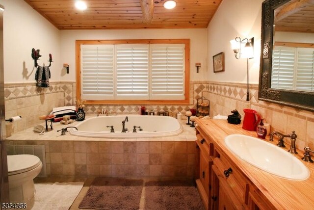 31 Kent Rd, Hampton Twp, NJ 07860 - full bathroom featuring toilet, tile patterned floors, a wainscoted wall, wooden ceiling, and a bath