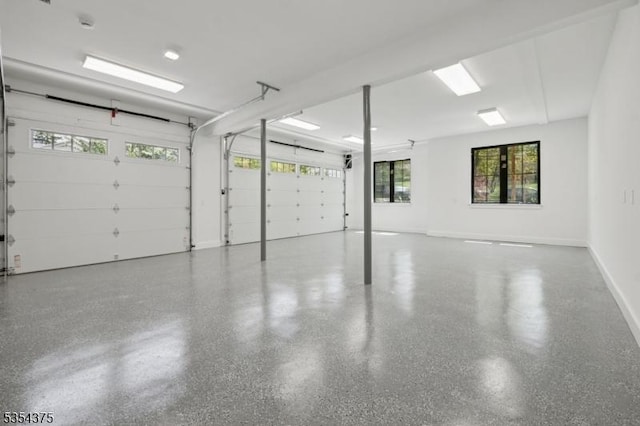 garage featuring baseboards