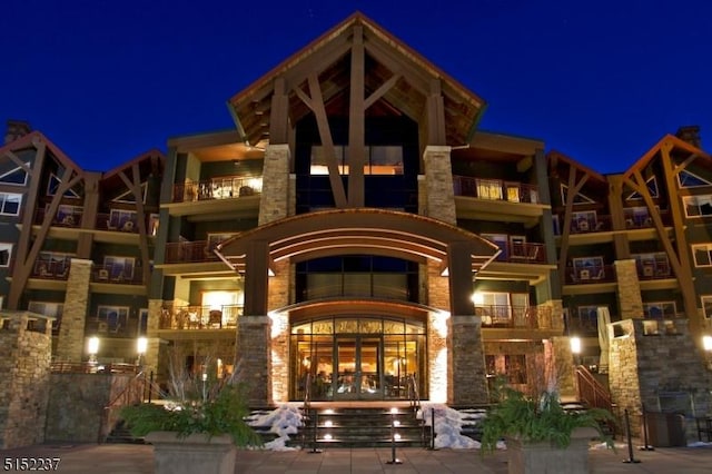 view of property at twilight