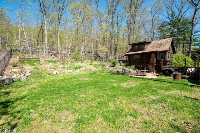 view of yard with fence