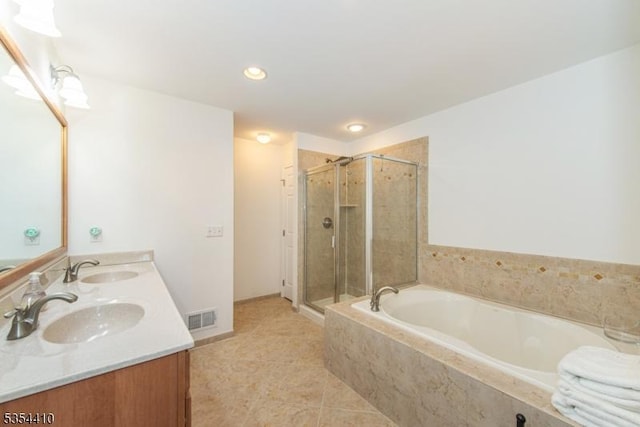 full bathroom featuring visible vents, a bath, tile patterned floors, a shower stall, and a sink