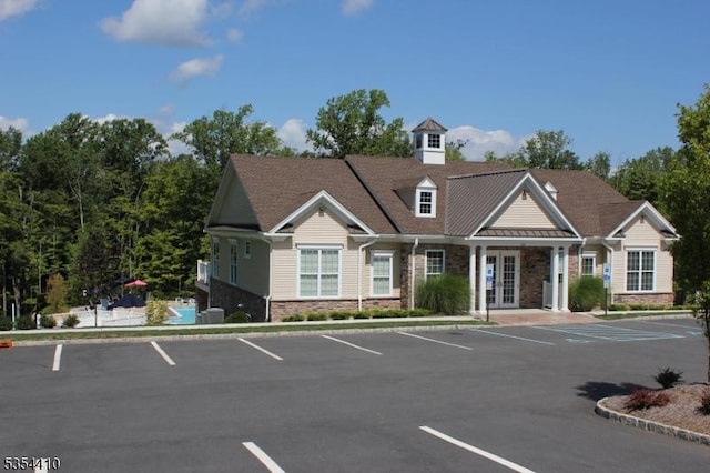 exterior space with uncovered parking