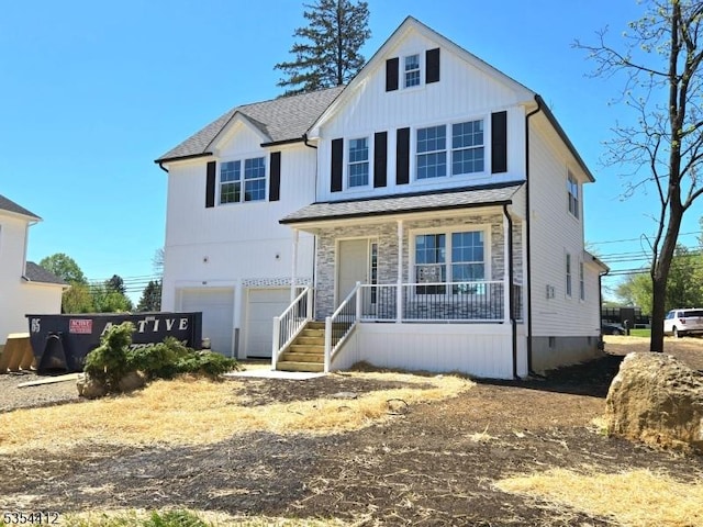 521 Parkwood Ct, Phillipsburg Town, NJ 08865 - view of front of home featuring a porch, a garage, and stone siding